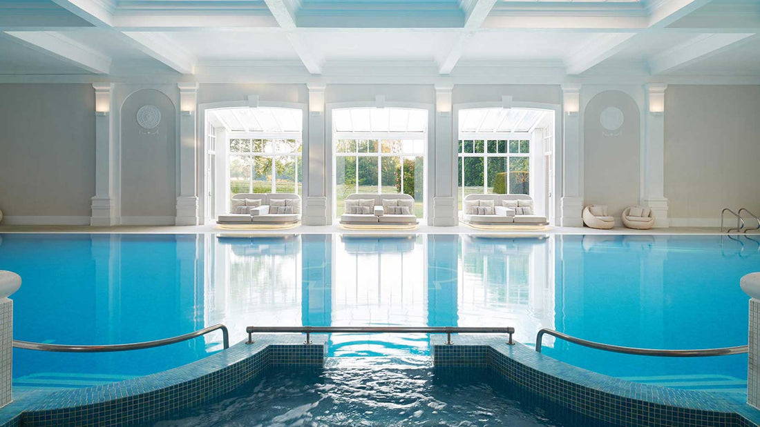 empty blue indoor swimming pool at a spa