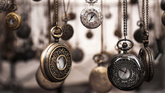 old-fashioned watches on chains hanging down to signify time