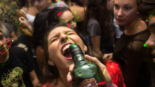 woman drinking alcohol at a party